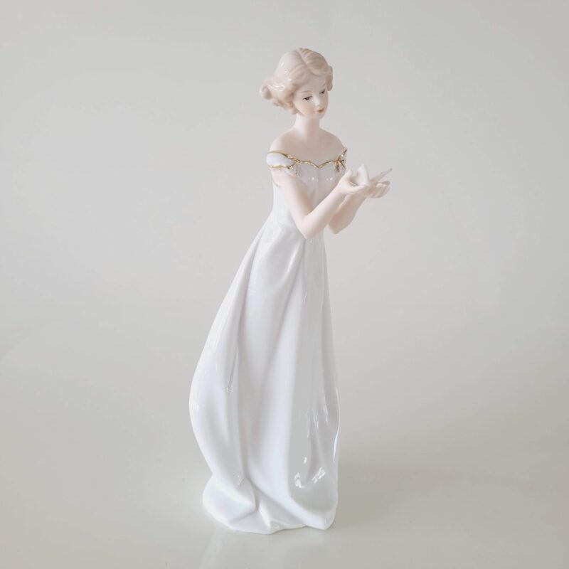 Figura de porcelana dama com borboleta