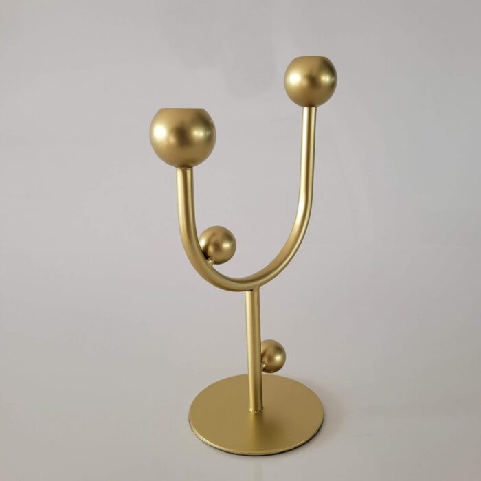 Castiçal de metal duplo dourado